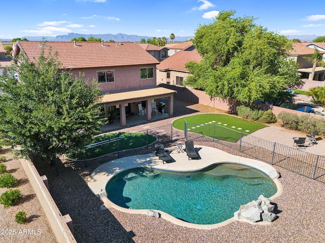 941 E Stirrup Ln, San Tan Valley, AZ 85143 - view of swimming pool with a patio, a fenced backyard, and a mountain view