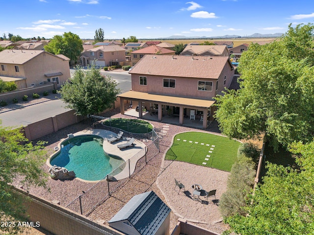941 E Stirrup Ln, San Tan Valley, AZ 85143 - view of pool featuring a residential view, a fenced backyard, and a patio