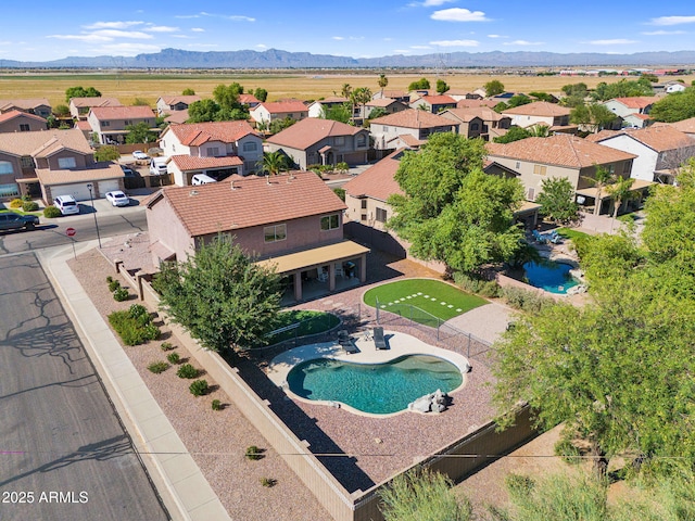941 E Stirrup Ln, San Tan Valley, AZ 85143 - aerial view of residential area featuring a pool area and mountains