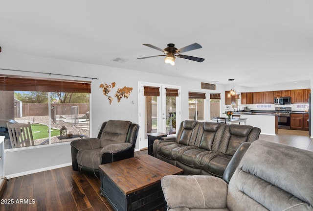 941 E Stirrup Ln, San Tan Valley, AZ 85143 - living area featuring a ceiling fan and wood finished floors