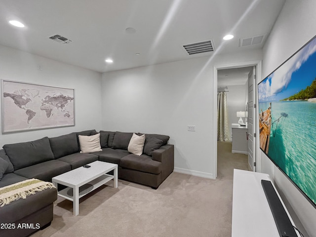 living room with visible vents and recessed lighting