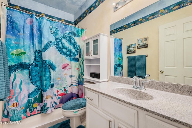 full bathroom featuring toilet, vanity, and shower / tub combo