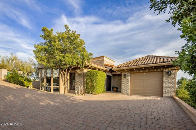 view of front of house with a garage