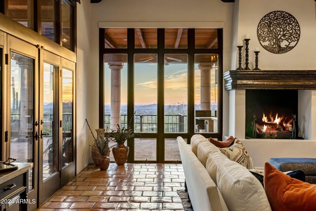 sunroom / solarium featuring french doors