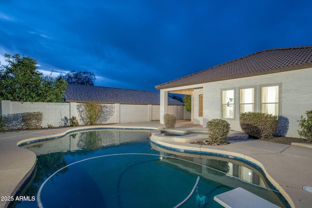 view of pool featuring a fenced backyard, a fenced in pool, and a patio