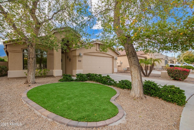 view of front of house with stucco siding, an attached garage, and concrete driveway