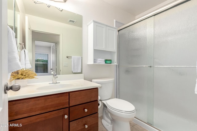 bathroom featuring visible vents, toilet, a shower stall, and tile patterned flooring