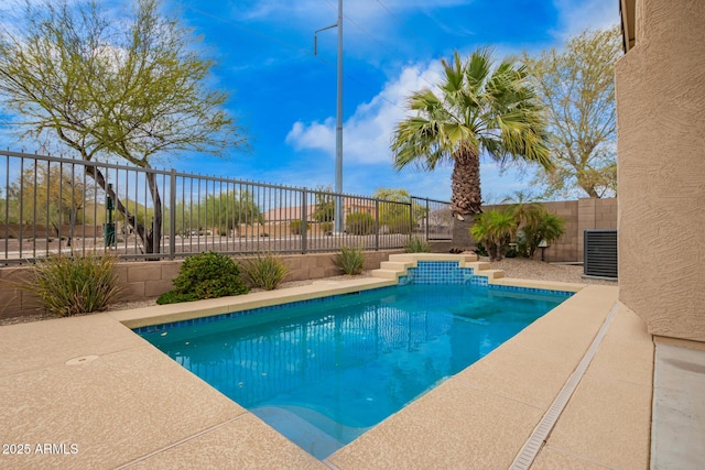 view of swimming pool featuring central AC unit, a fenced backyard, and a fenced in pool