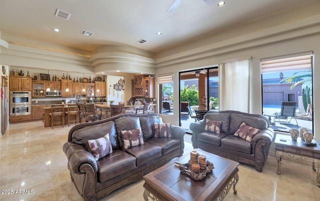 living room with ceiling fan