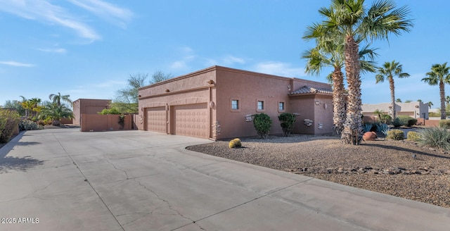 view of property exterior featuring a garage