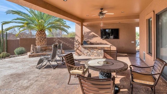 view of patio / terrace with ceiling fan