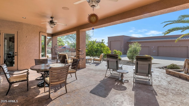 view of patio / terrace featuring ceiling fan