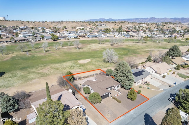 drone / aerial view with a residential view and a mountain view