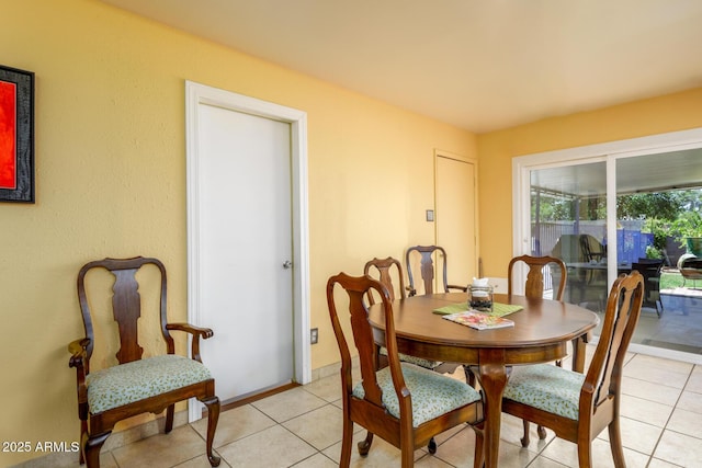 15212 N 37th Ave, Phoenix, AZ 85053 - dining space featuring light tile patterned floors