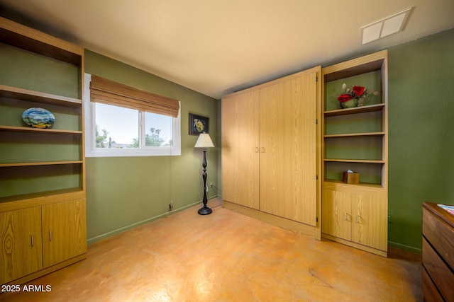 15212 N 37th Ave, Phoenix, AZ 85053 - unfurnished bedroom with visible vents, baseboards, and concrete floors