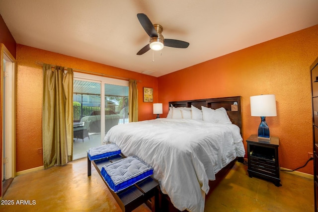 15212 N 37th Ave, Phoenix, AZ 85053 - bedroom featuring a textured wall, concrete flooring, access to exterior, baseboards, and a ceiling fan