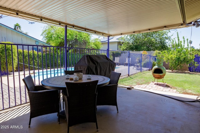 15212 N 37th Ave, Phoenix, AZ 85053 - view of patio / terrace featuring a fenced in pool, a fenced backyard, outdoor dining space, and area for grilling