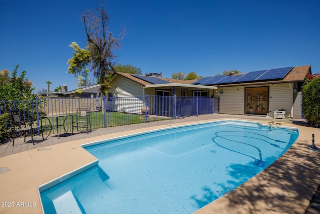 15212 N 37th Ave, Phoenix, AZ 85053 - view of swimming pool featuring a fenced in pool, a patio area, fence, and a yard