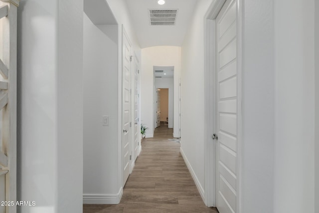 hall featuring light hardwood / wood-style flooring