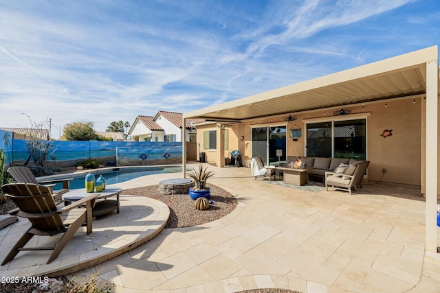 view of patio featuring a fenced in pool, an outdoor hangout area, and ceiling fan