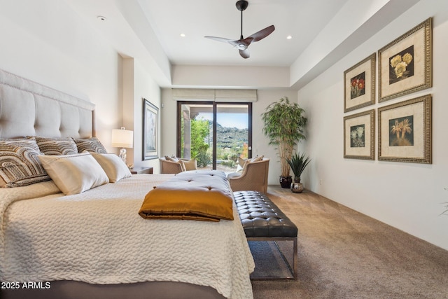 bedroom with ceiling fan and carpet floors