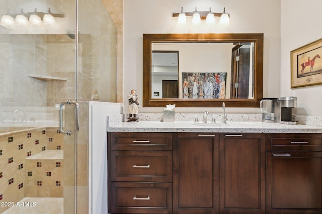 bathroom with vanity and walk in shower