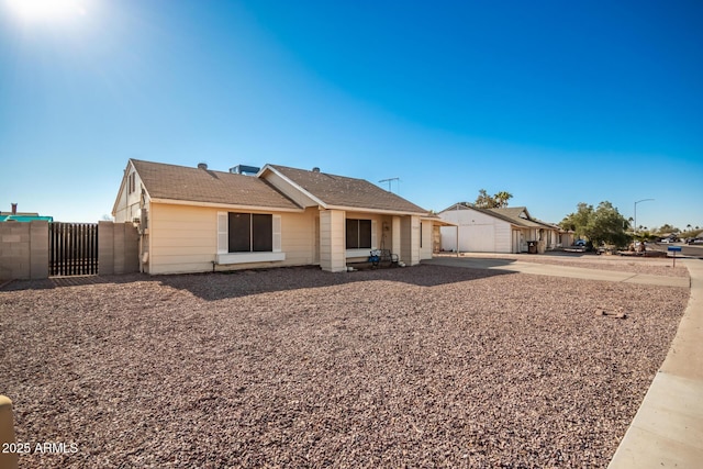 ranch-style house featuring a garage