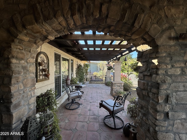 view of patio featuring a pergola