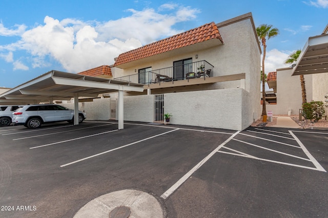 view of car parking with a carport