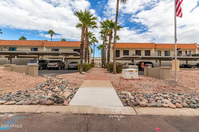 view of front facade with a carport