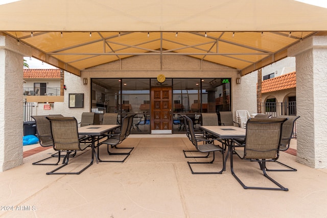 view of patio / terrace featuring a balcony and a gazebo