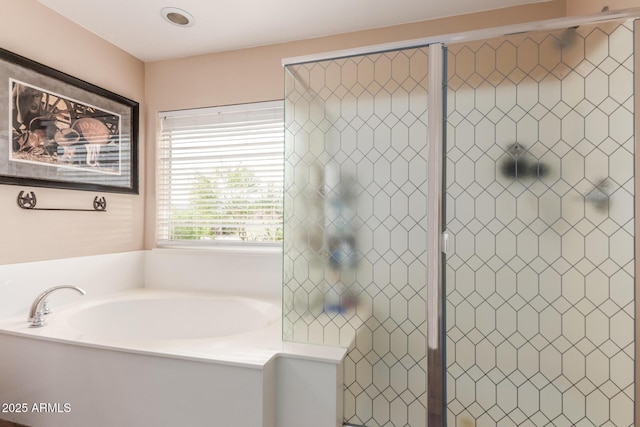 22022 W Moonlight Path, Buckeye, AZ 85326 - bathroom with a garden tub and a shower stall