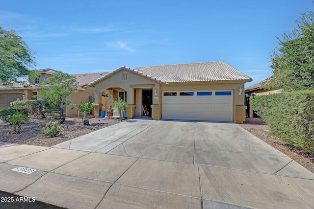 9926 W Gross Ave, Tolleson, AZ 85353 - ranch-style home with stucco siding, a tiled roof, an attached garage, and concrete driveway
