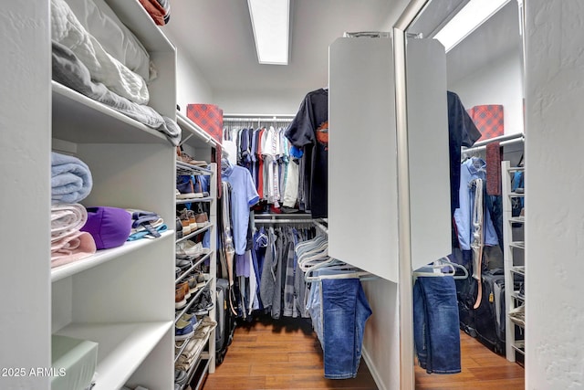 9926 W Gross Ave, Tolleson, AZ 85353 - walk in closet with wood finished floors