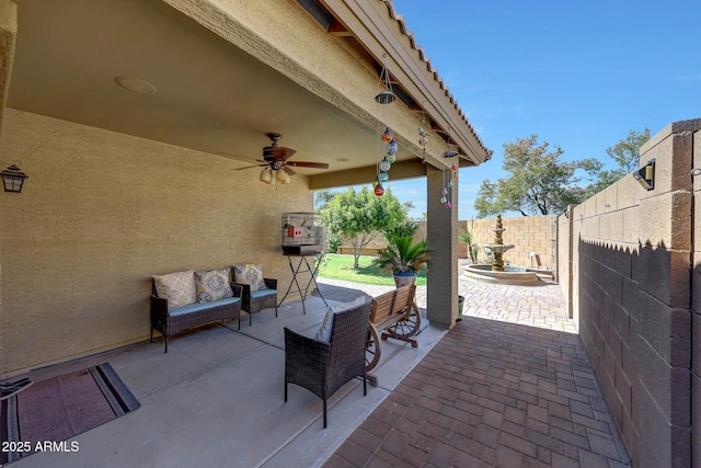 9926 W Gross Ave, Tolleson, AZ 85353 - fenced backyard with a patio, a ceiling fan, and outdoor lounge area