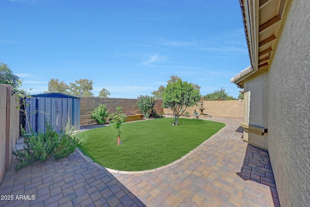9926 W Gross Ave, Tolleson, AZ 85353 - fenced backyard featuring a patio area and a shed