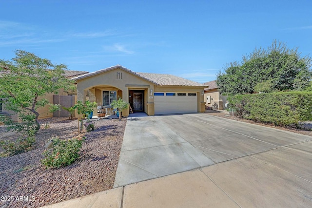 9926 W Gross Ave, Tolleson, AZ 85353 - single story home featuring a garage, stucco siding, concrete driveway, a porch, and a tile roof