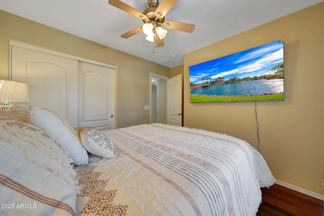 9926 W Gross Ave, Tolleson, AZ 85353 - bedroom with wood finished floors, a closet, and ceiling fan