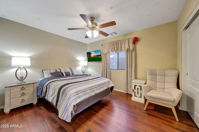 9926 W Gross Ave, Tolleson, AZ 85353 - bedroom with dark wood-type flooring and a ceiling fan