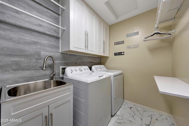 9926 W Gross Ave, Tolleson, AZ 85353 - laundry room with cabinet space, washer and clothes dryer, light marble finish floors, and attic access