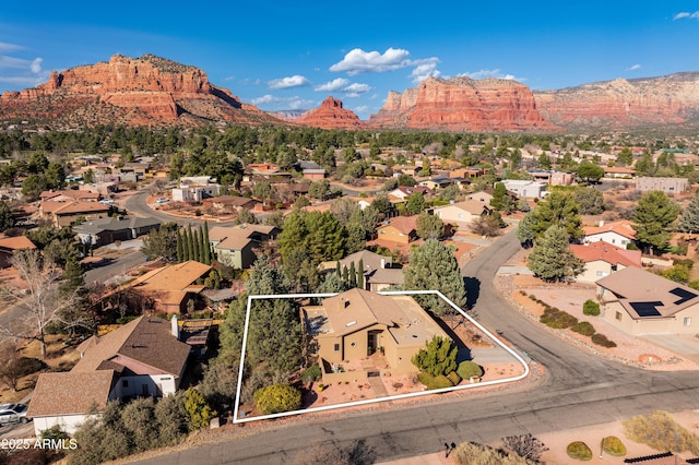 birds eye view of property featuring a residential view and a mountain view