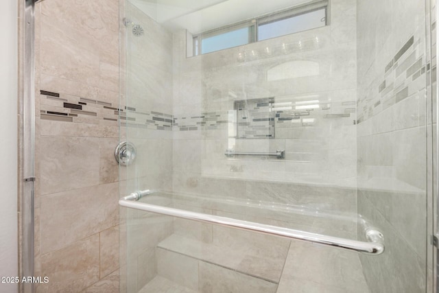 bathroom with a stall shower