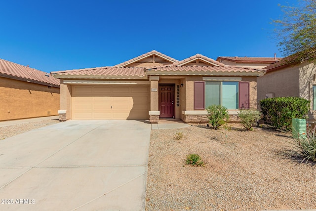 ranch-style house featuring a garage, a tile roof, stucco siding, and concrete driveway