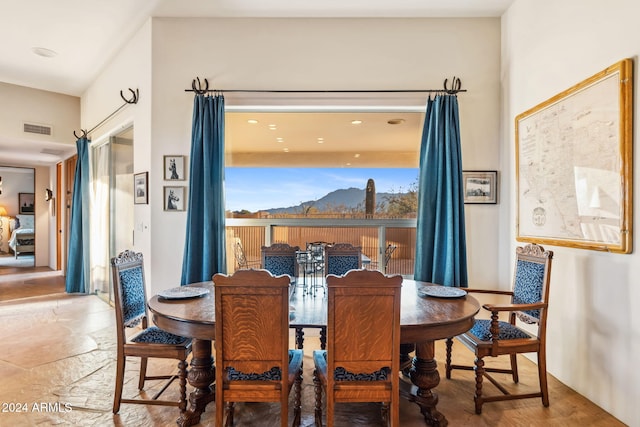 dining space featuring hardwood / wood-style floors