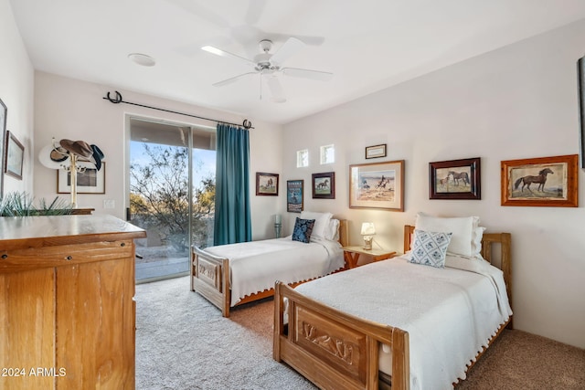 carpeted bedroom featuring access to exterior and ceiling fan