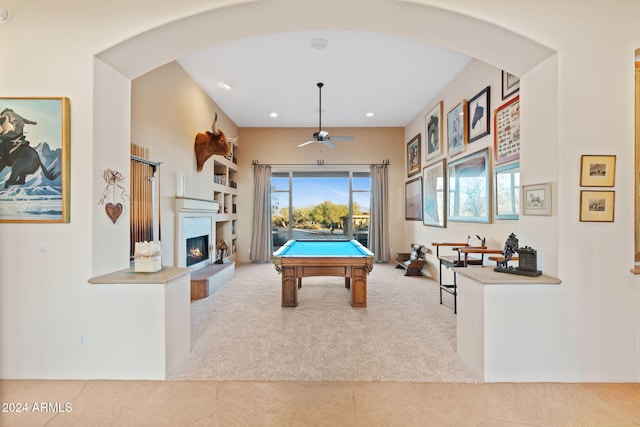 rec room with light colored carpet, ceiling fan, and billiards