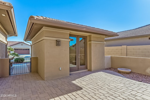 view of patio / terrace with a garage