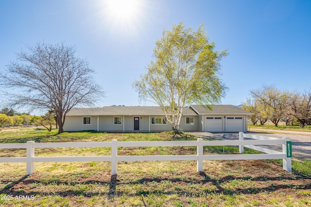 8230 Koch Field Rd, Flagstaff, AZ 86004 - ranch-style house with an attached garage and concrete driveway