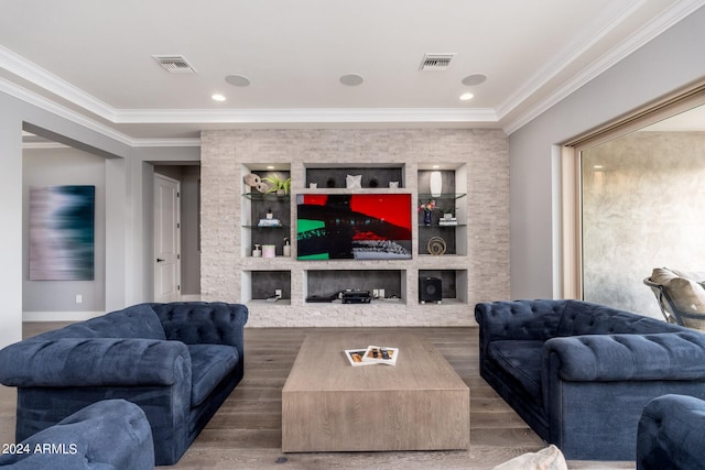 living room featuring ornamental molding and hardwood / wood-style floors