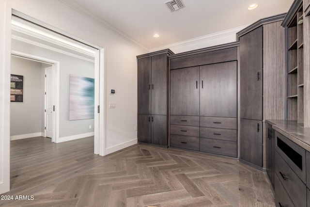 interior space with dark parquet flooring